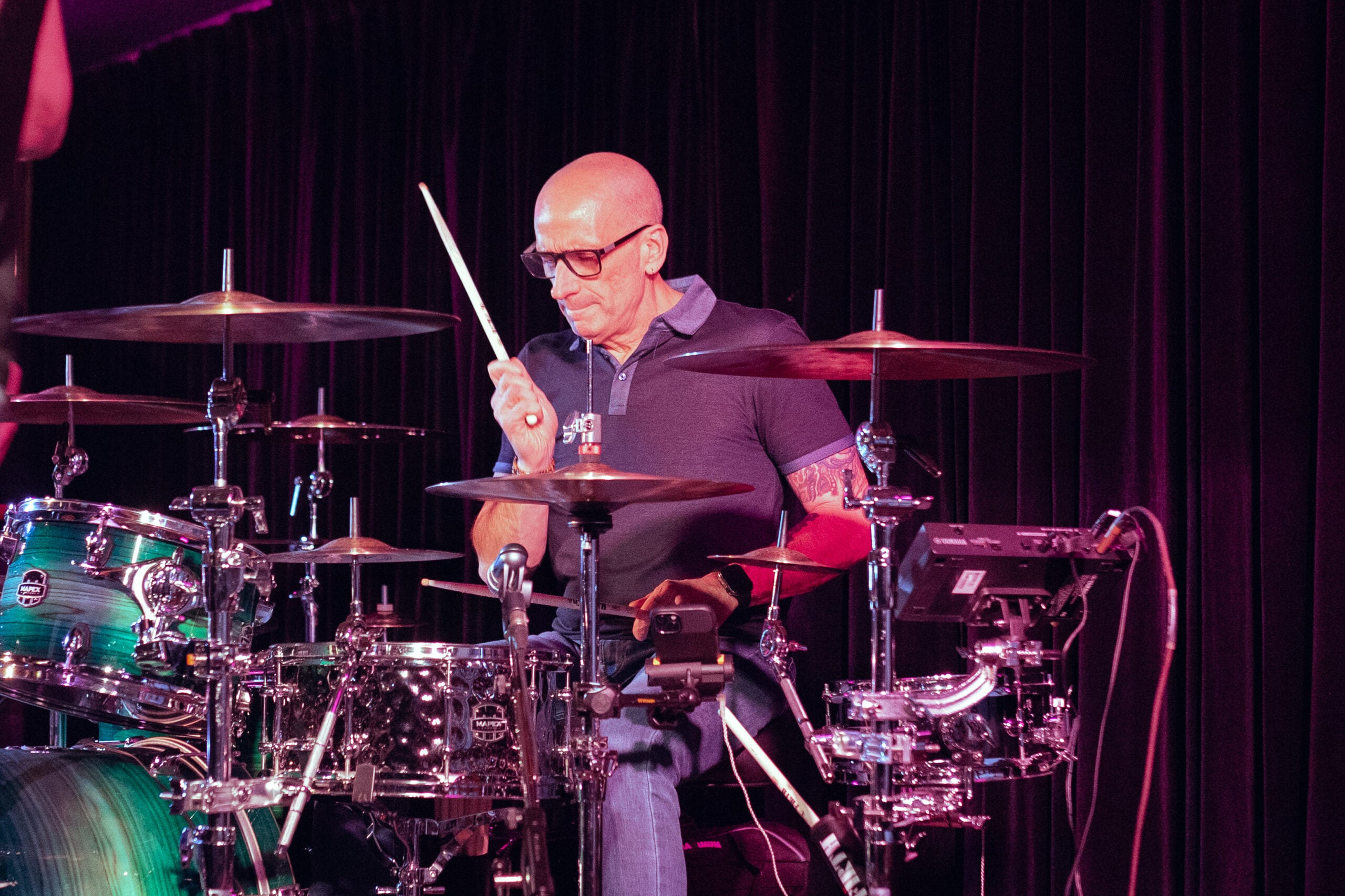 Candid photo of Michel at the drum kit